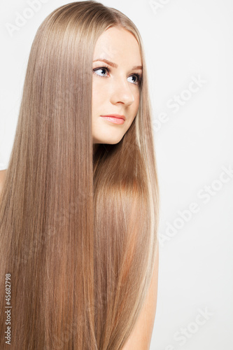 Portrait of young woman with long hair