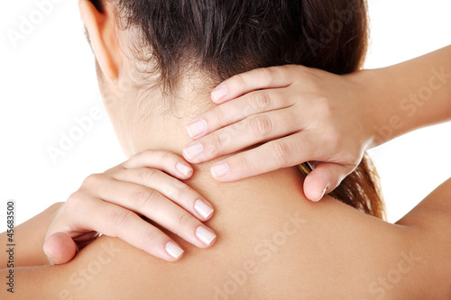 Young woman with pain in her back