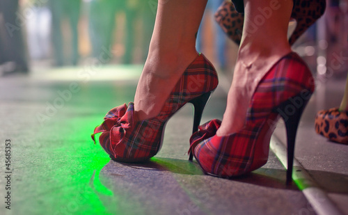 Female legs in shoes high heels