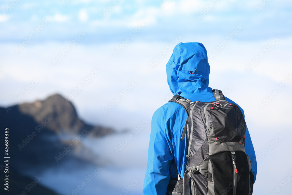 Hiker looking at view Hiker looking at view