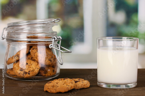 Glass of milk with cookies