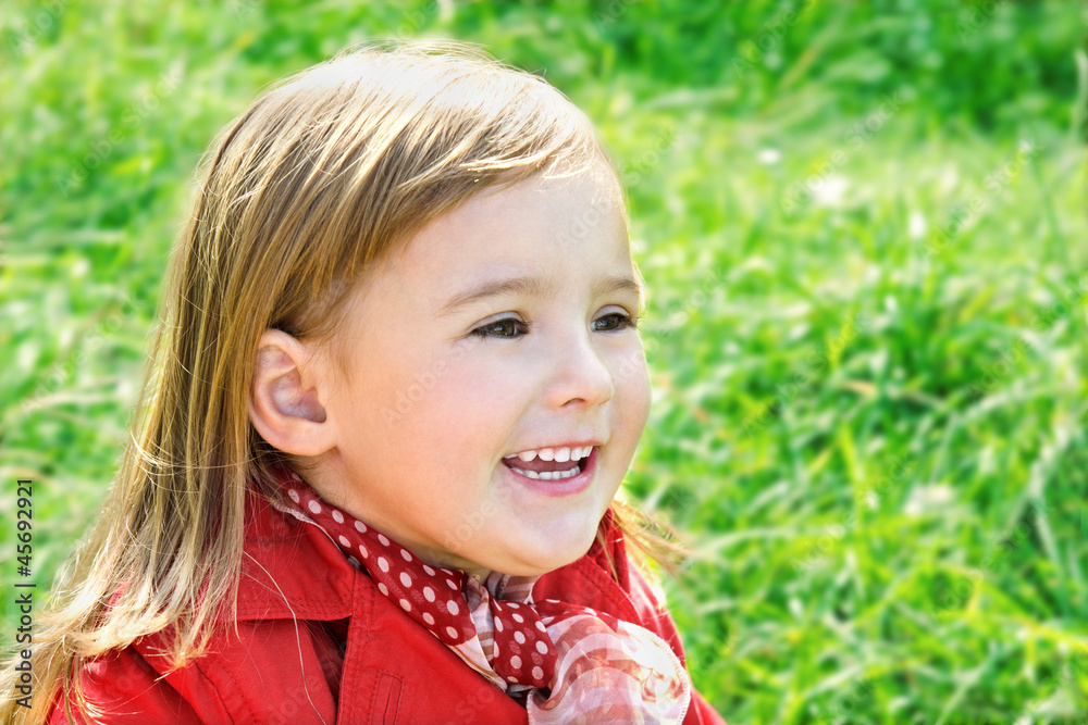 Outdoor portrait of cute laughing little girl Outdoor portrait of cute laughing little girl