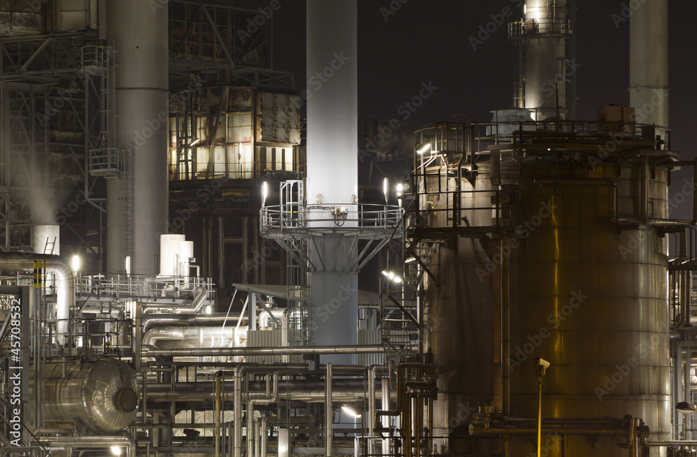 Close-up of an oil-refinery plant at night Close-up of an oil-refinery plant at night