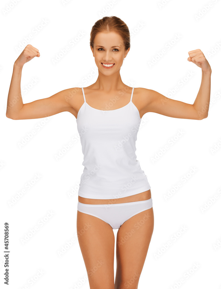 woman in cotton undrewear flexing her biceps woman in cotton undrewear flexing her biceps