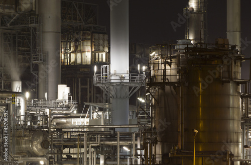 Close-up of an oil-refinery plant at night © corlaffra