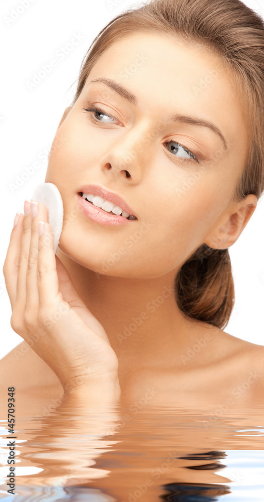 beautiful woman with cotton pad