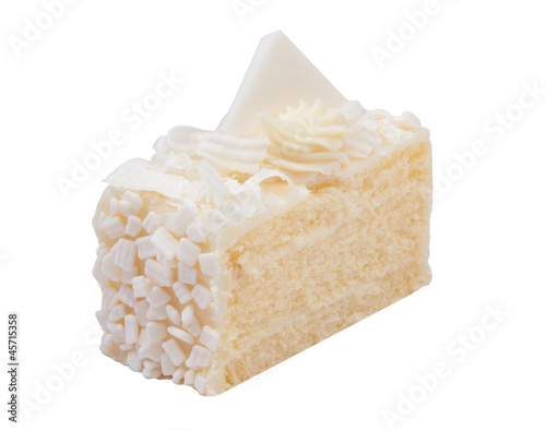 Vanilla favor cake topping with white chocolate isolates on whit