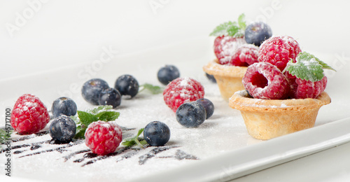 Fruits cake and fresh berries