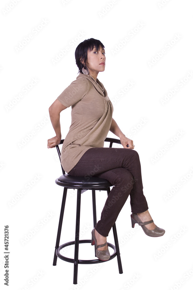 Beautiful Woman Posing on a Chair Beautiful Woman Posing on a Chair