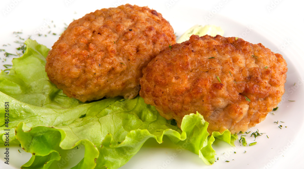 cutlets and salad on a plate cutlets and salad on a plate