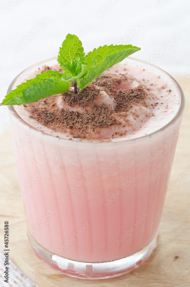 Watermelon cocktail with milk and mint close up Watermelon cocktail with milk and mint close up