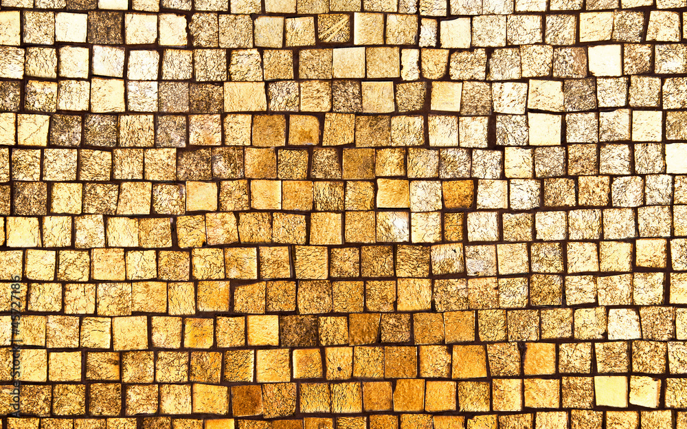Naklejka premium Golden mosaic wall background