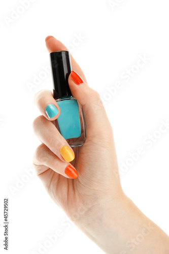 woman hand with nail polish isolated on white