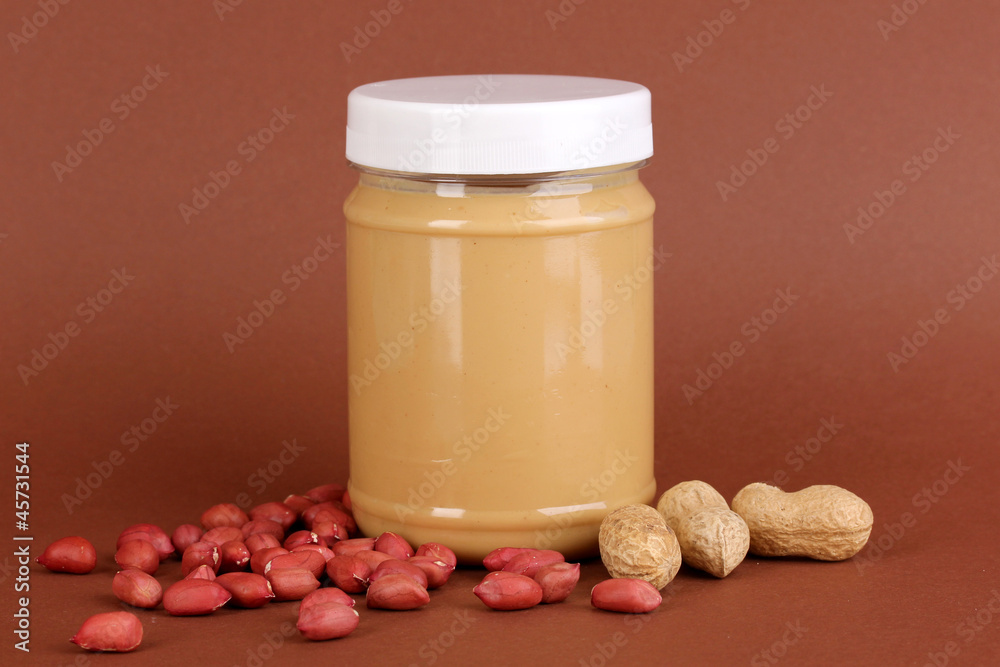 Delicious peanut butter in jar of peanut near Delicious peanut butter in jar of peanut near