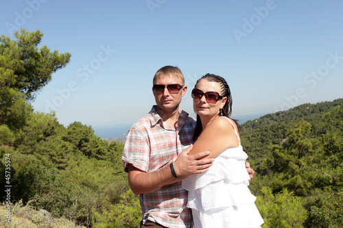 Portrait of couple on valley background