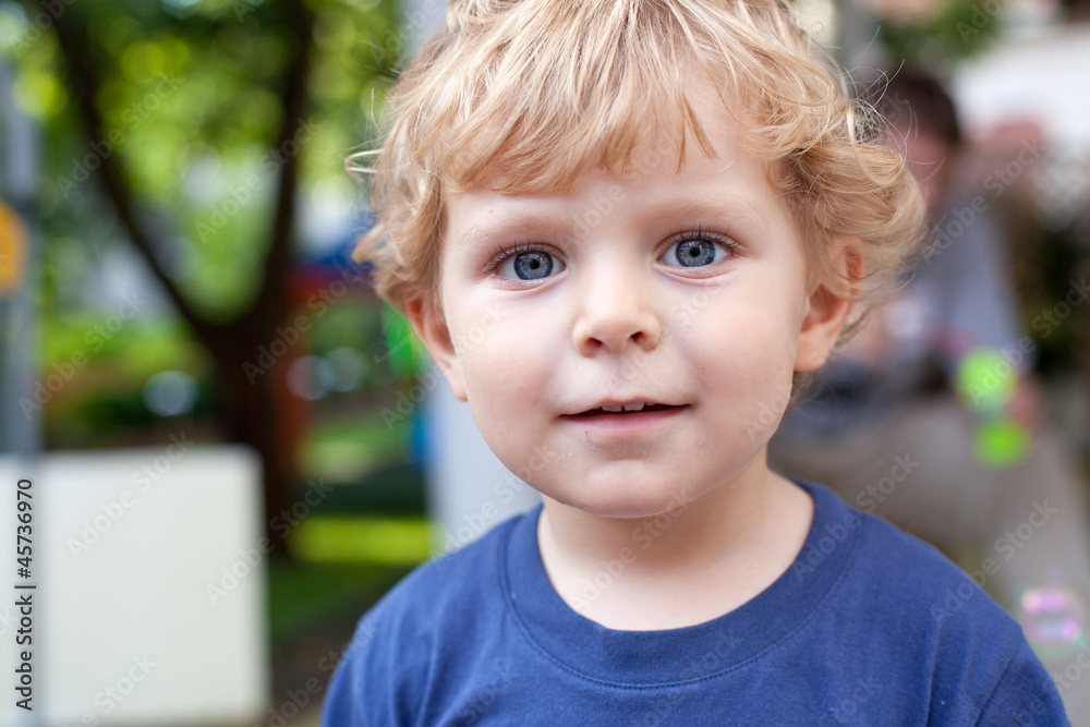 Portrait of little toddler boy with blond hairs Portrait of little toddler boy with blond hairs