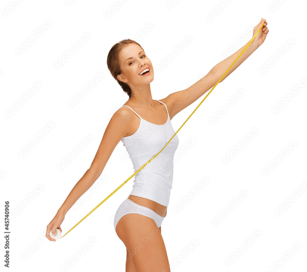young beautiful woman with measure tape young beautiful woman with measure tape