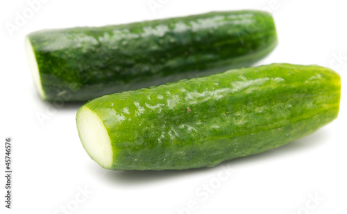 salted cucumber on white background