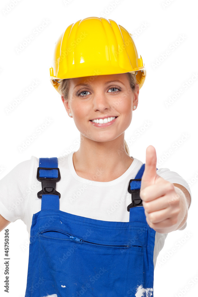 motivierte arbeiterin mit schutzhelm motivierte arbeiterin mit schutzhelm