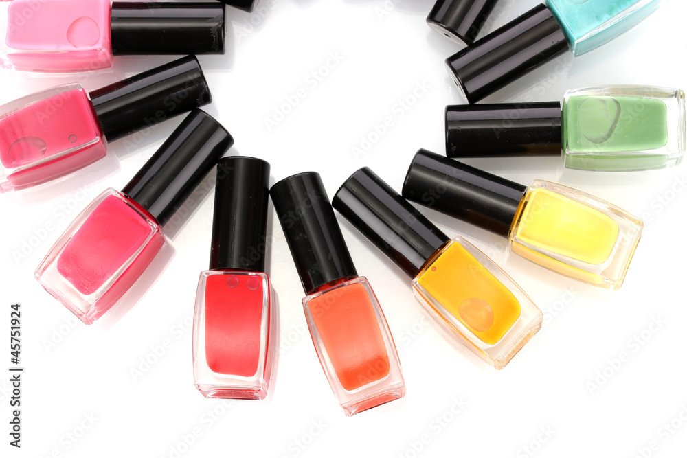 Obraz premium Group of bright nail polishes isolated on white