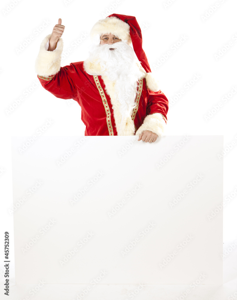 père noël appuyé sur une pancarte père noël appuyé sur une pancarte