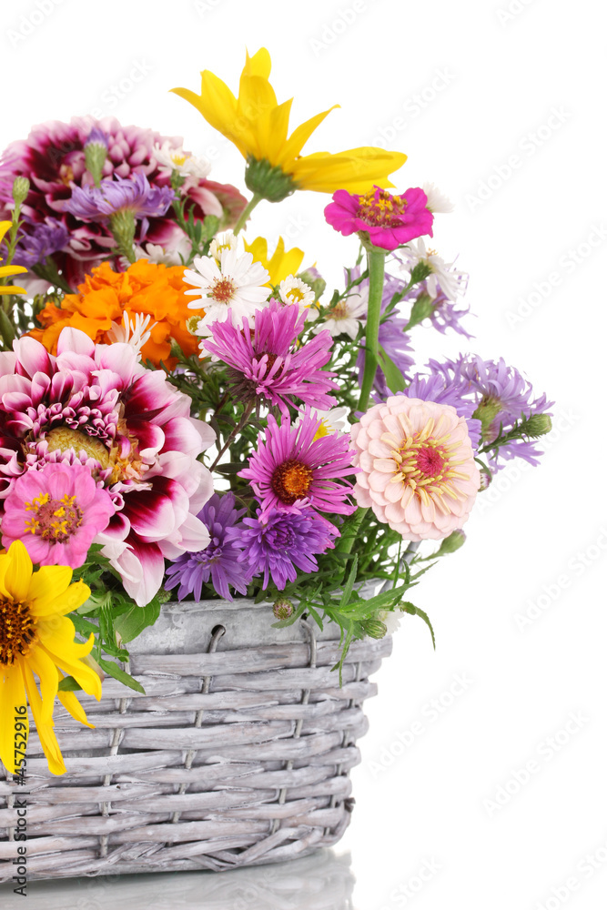 beautiful bouquet of bright flowers in basket isolated on white