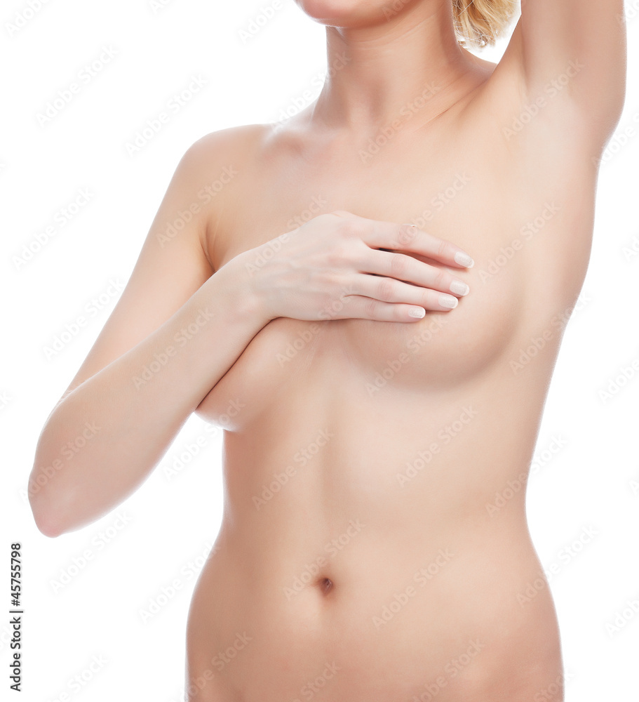 Cropped image of a female controlling breast for cancer Cropped image of a female controlling breast for cancer