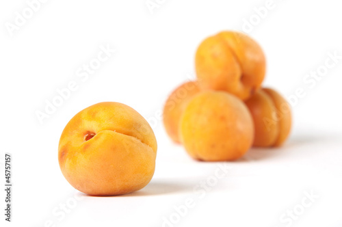 Apricot fruits isolated on white background