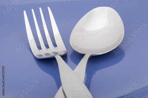 close up image of spoon and fork photo