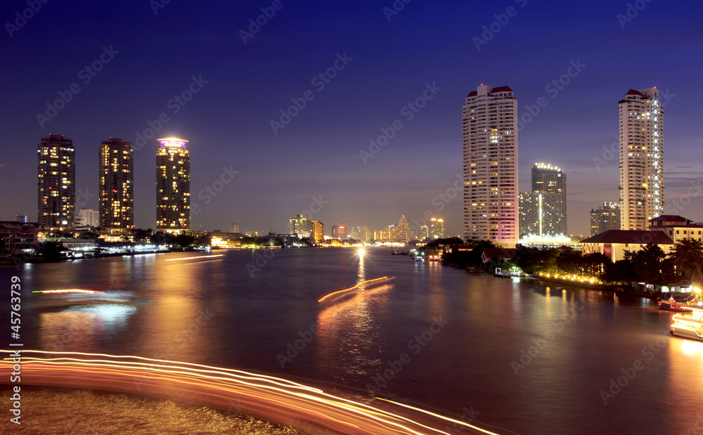 Obraz premium City and the river in the night time.