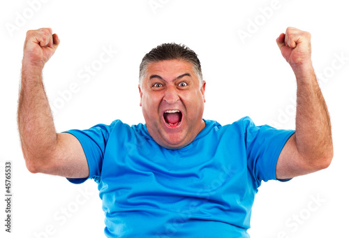 Portrait of happy man with hands lifted upwards