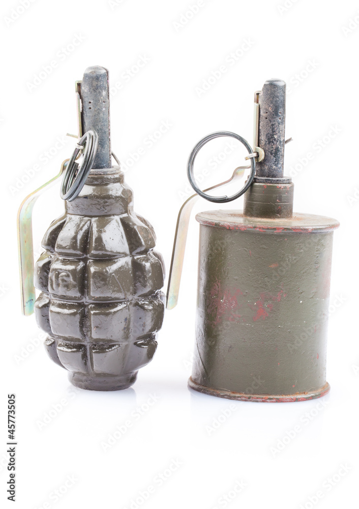 Close-up of old training grenades isolated on a white background Close-up of old training grenades isolated on a white background