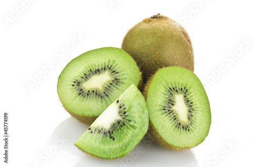  kiwi fruit and his sliced close up on white