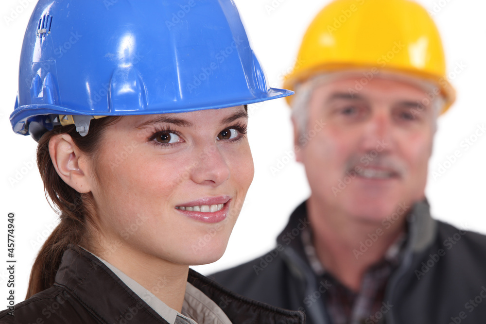 Female architect with senior builder Female architect with senior builder