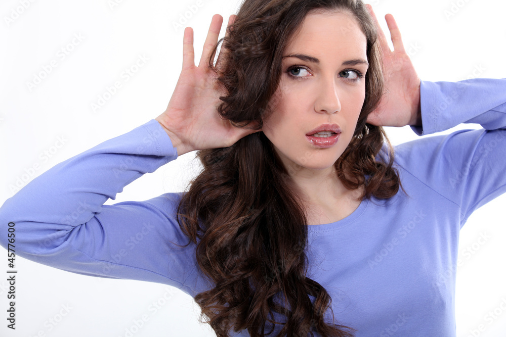 Fototapeta premium Woman with her hands to her ears