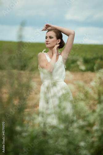 Beautiful lady in wheat field 