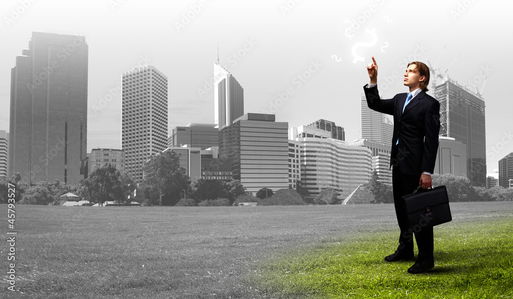 Businessman with colourful light beam in his hands Businessman with colourful light beam in his hands