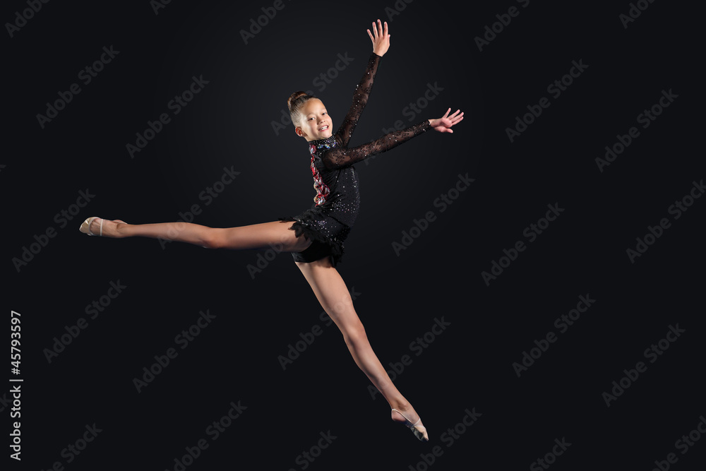 Young woman in gymnast suit posing Young woman in gymnast suit posing