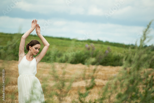 Beautiful lady in wheat field 