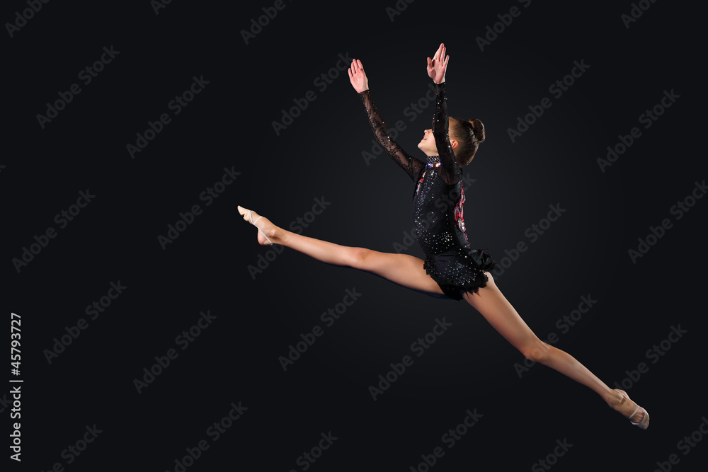 Young woman in gymnast suit posing Young woman in gymnast suit posing