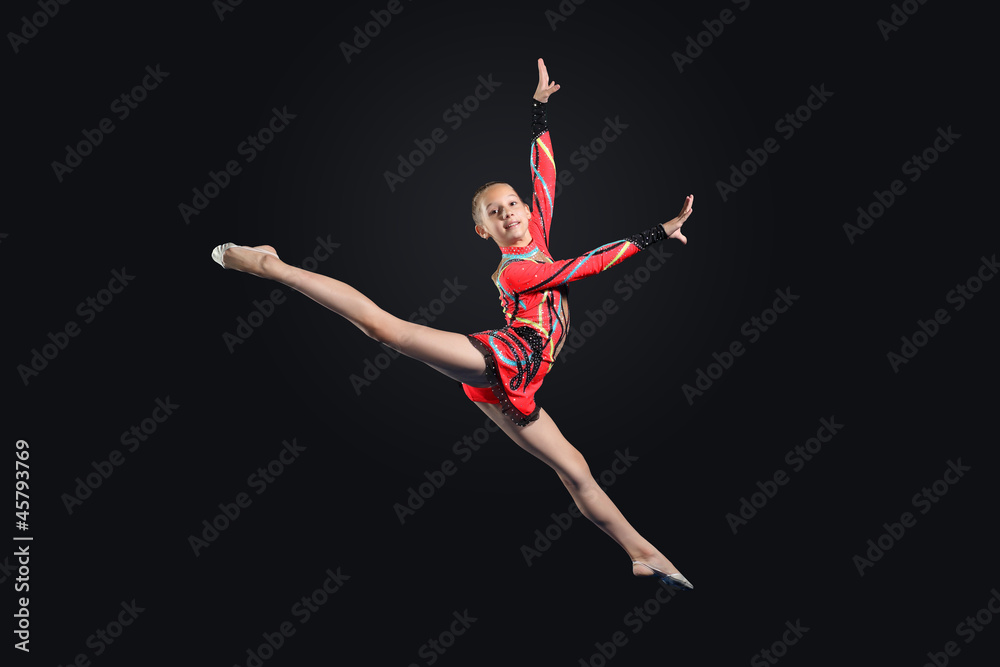 Young woman in gymnast suit posing Young woman in gymnast suit posing