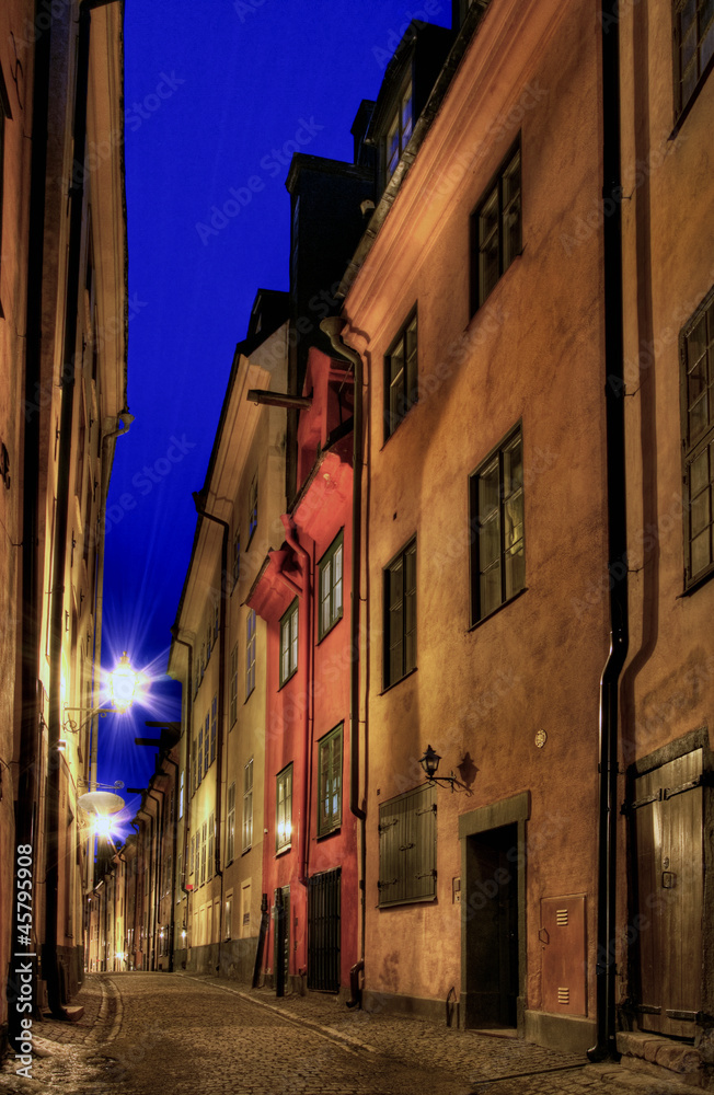 Stockholm Old Town alley at night.