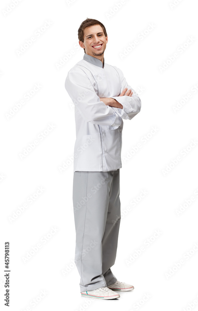 Full length portrait of chef cook with arms crossed Full length portrait of chef cook with arms crossed