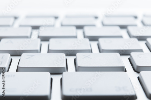 Close up of keys of white laptop keyboard