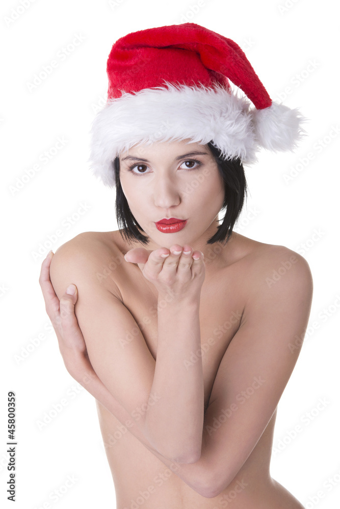 Sexy toples woman with perfect slim body wearing santa hat Sexy toples woman with perfect slim body wearing santa hat