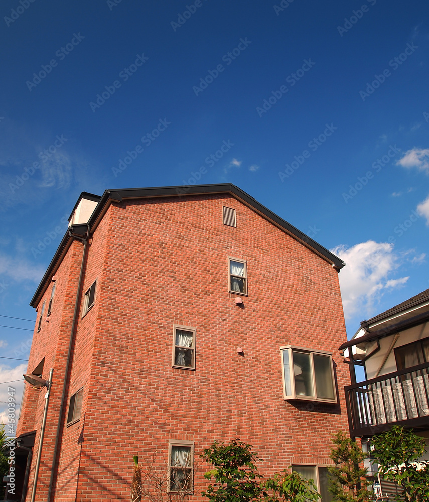 small house and blue sky in Tokyo, Japan