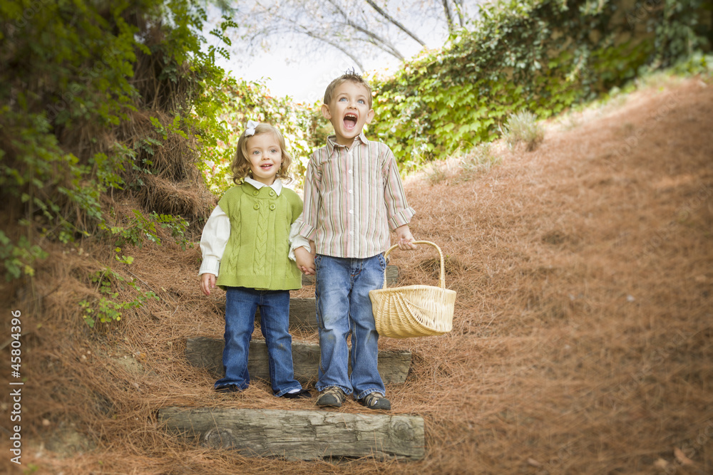 Two Children Walking Down Wood Steps with Basket Outside.