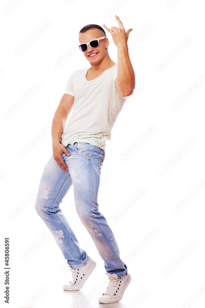 Portrait of handsome man posing in studio on white background