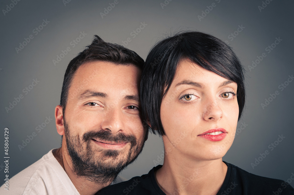Intimate couple studio portrait. Intimate couple studio portrait.