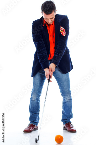 Portrait of handsome man posing in studio on white background wi